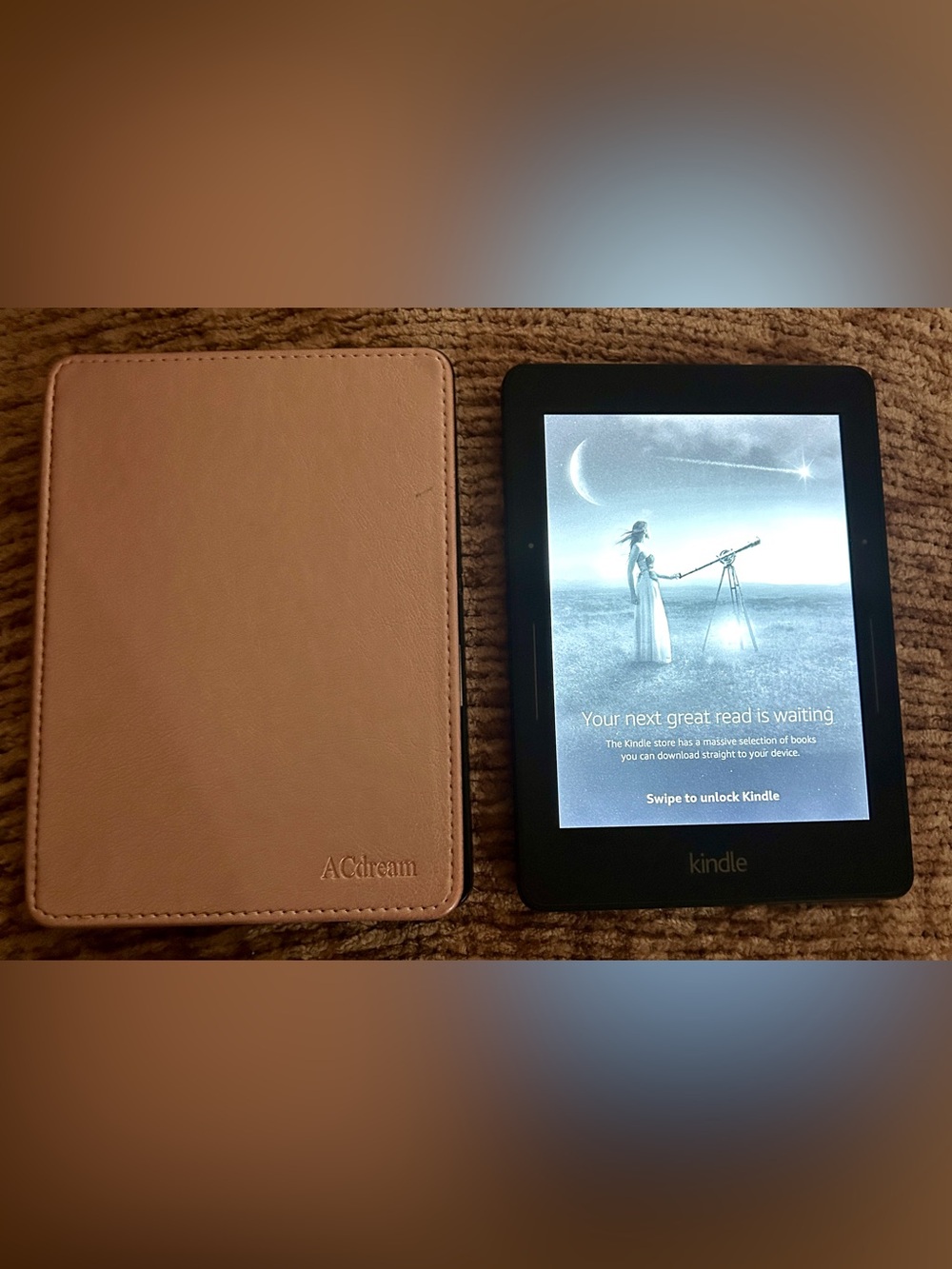 Amazon Kindle Voyager 7th generation. With case